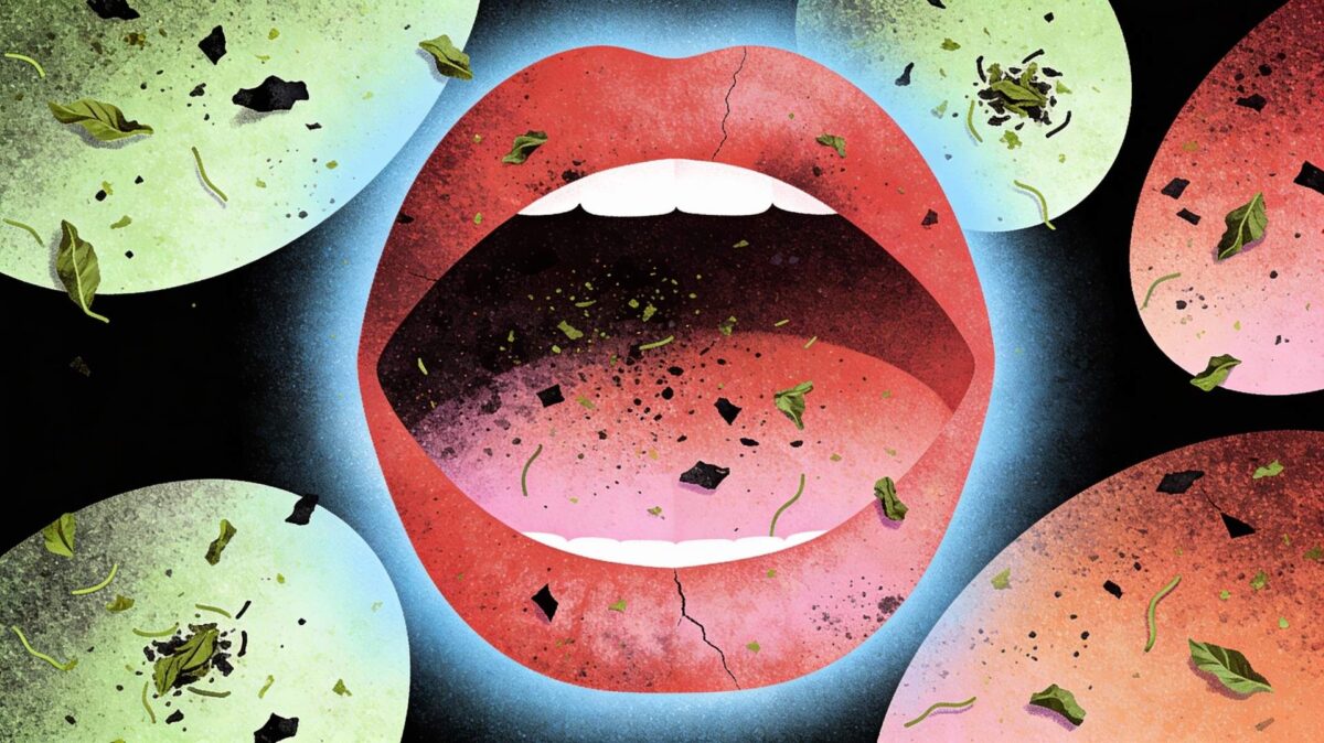 A close-up of an open mouth dominates the center of the image. The vivid red and slightly cracked lips reveal clearly defined white teeth. Around the mouth, spheres in shades of green, blue, and pink hover against a black background, while small dark fragments and green leaves appear to float or issue from the mouth, suggesting a sensory or gustatory explosion.