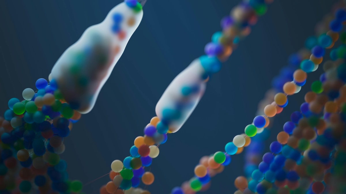 Illustration of colored molecules on a blue background, with spherical structures of multiple colors—orange, blue, green, purple, and beige—arranged in chains and groups, representing the interaction of drugs with cellular receptors at the molecular level