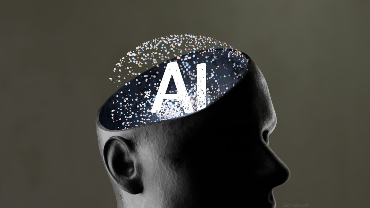 Cabeça humana estilizada com o topo aberto, com as letras “AI” iluminadas em seu interior, rodeadas por partículas brilhantes, simbolizando uso de inteligência artificial em processos mentais.